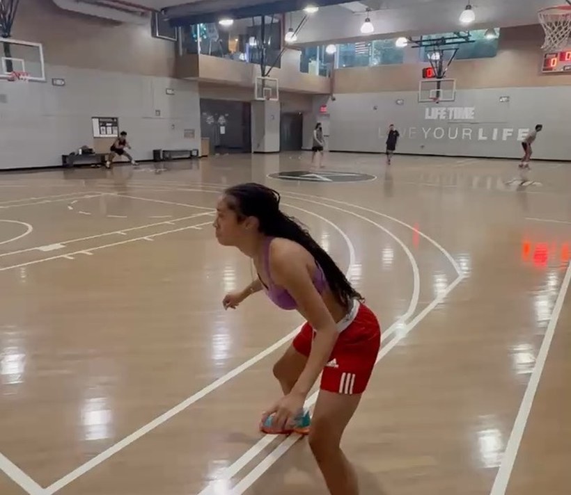 A basketball athlete working through a low agility drill